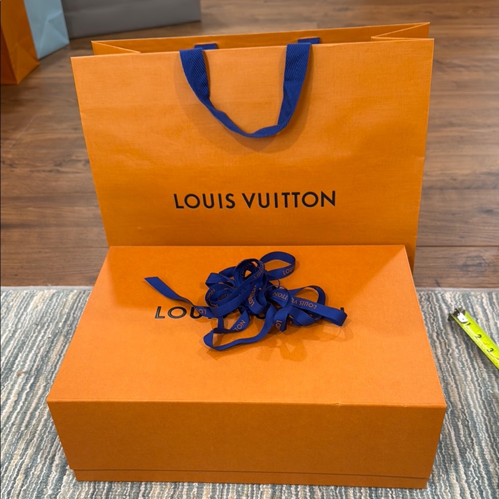 Louis Vuitton Signature Orange magnetic Box with shopping bag and ribbon.
